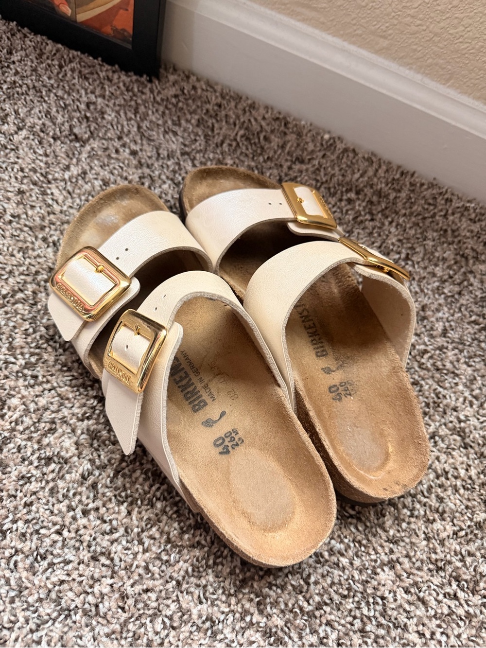 Birkenstock Cream Arizona Sandals with Gold Buckles